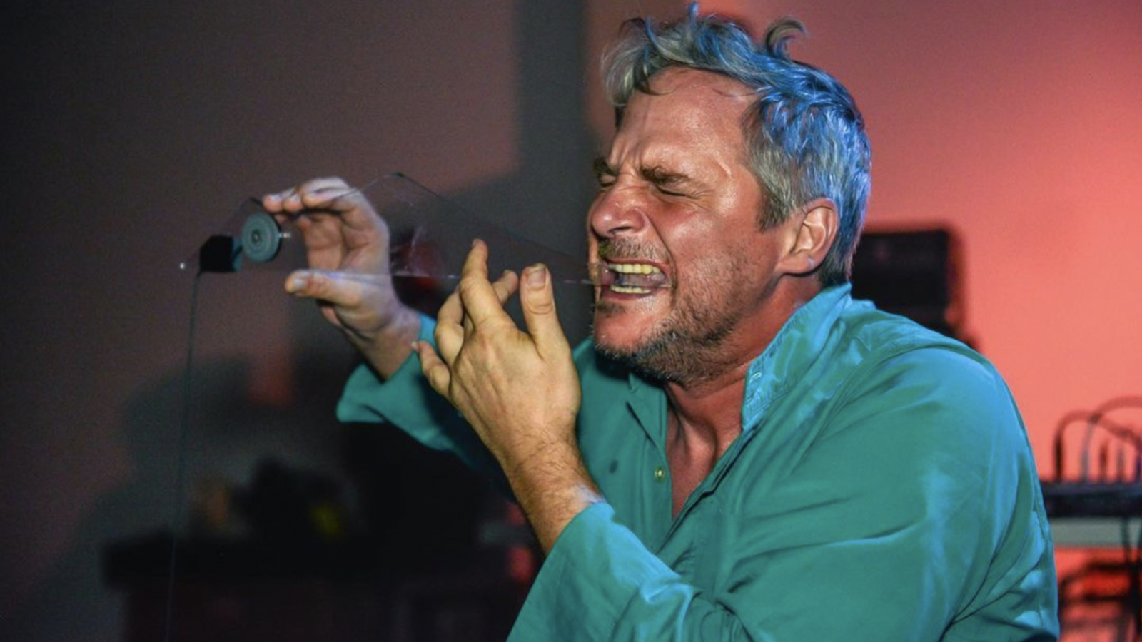 Granpa with glass instrument on stage